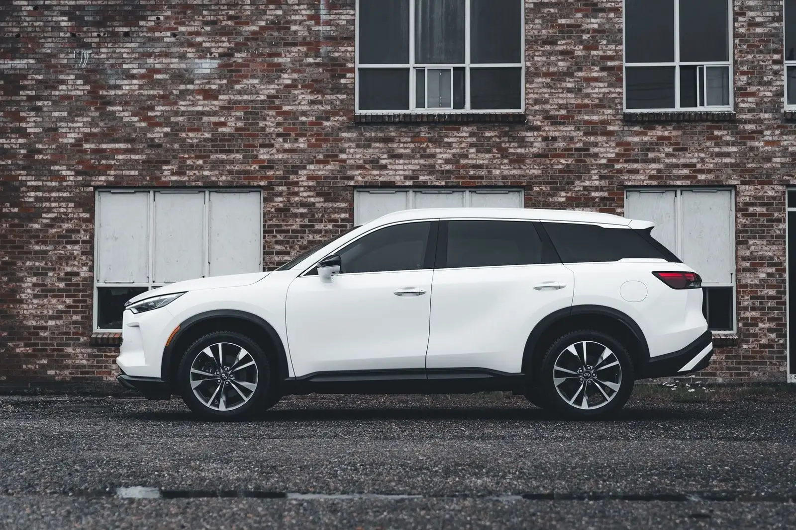 White SUV, side profile