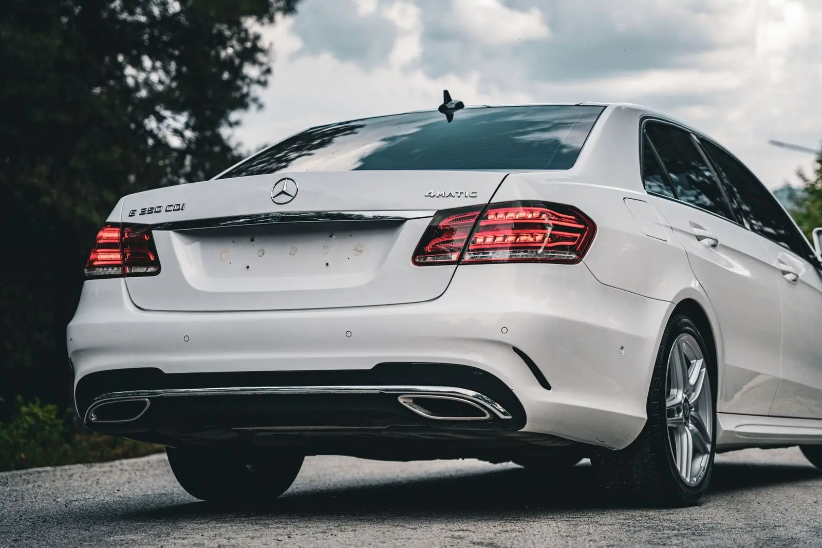 White sedan, rear view