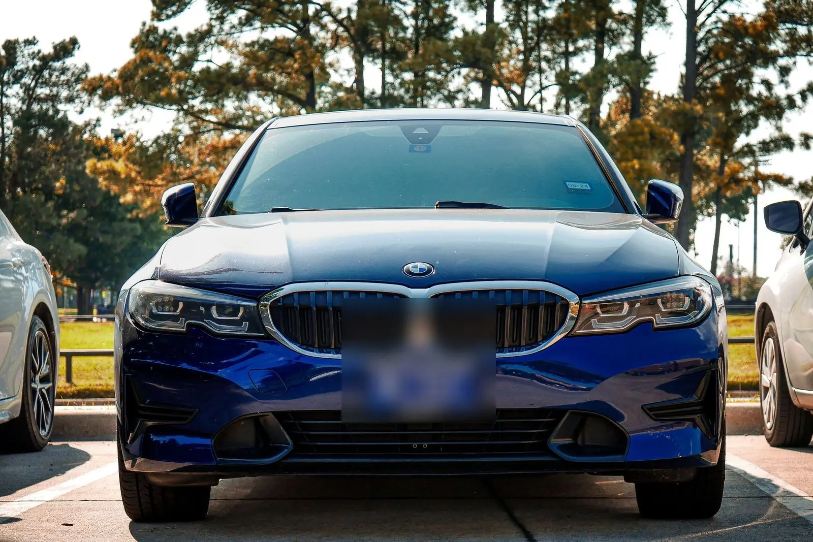 Dark blue BMW, front view